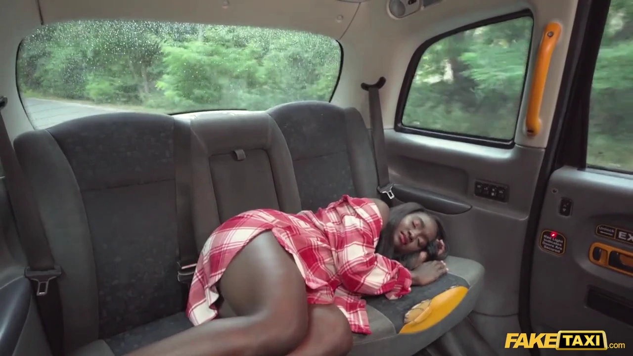 Ebony babe exposes herself and invites rough sex in a faked taxi porn video